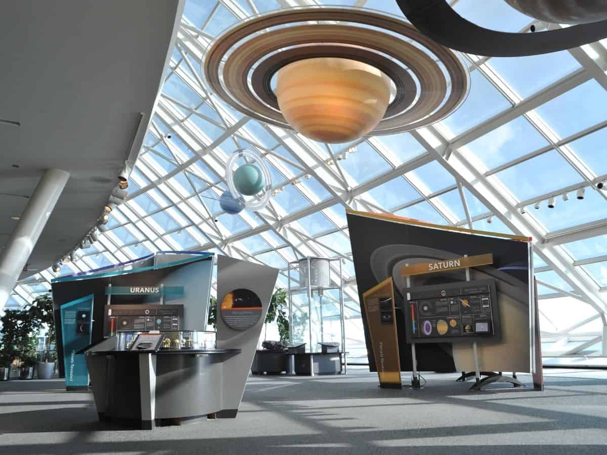 A model of Saturn hangs above an exhibit at the Adler Planeterium in Chicago