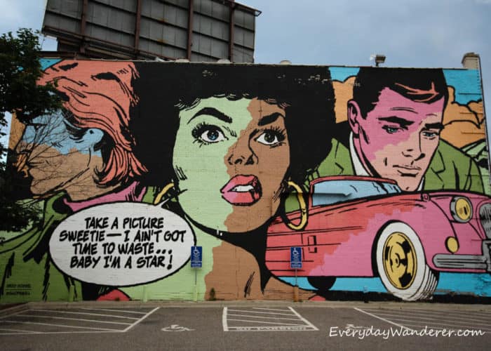 A mural blending Prince lyrics and a comic book style.