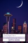 Night skyline of Seattle with the Space Needle in the foreground and a crescent moon above. Text overlay reads, "Best Things to do in Seattle, WA with Kids.