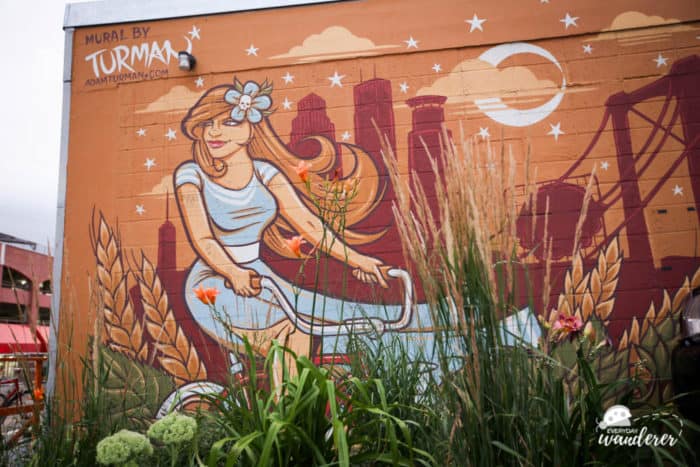 The exterior wall of Butcher & the Boar is one of the longest murals in downtown Minneapolis