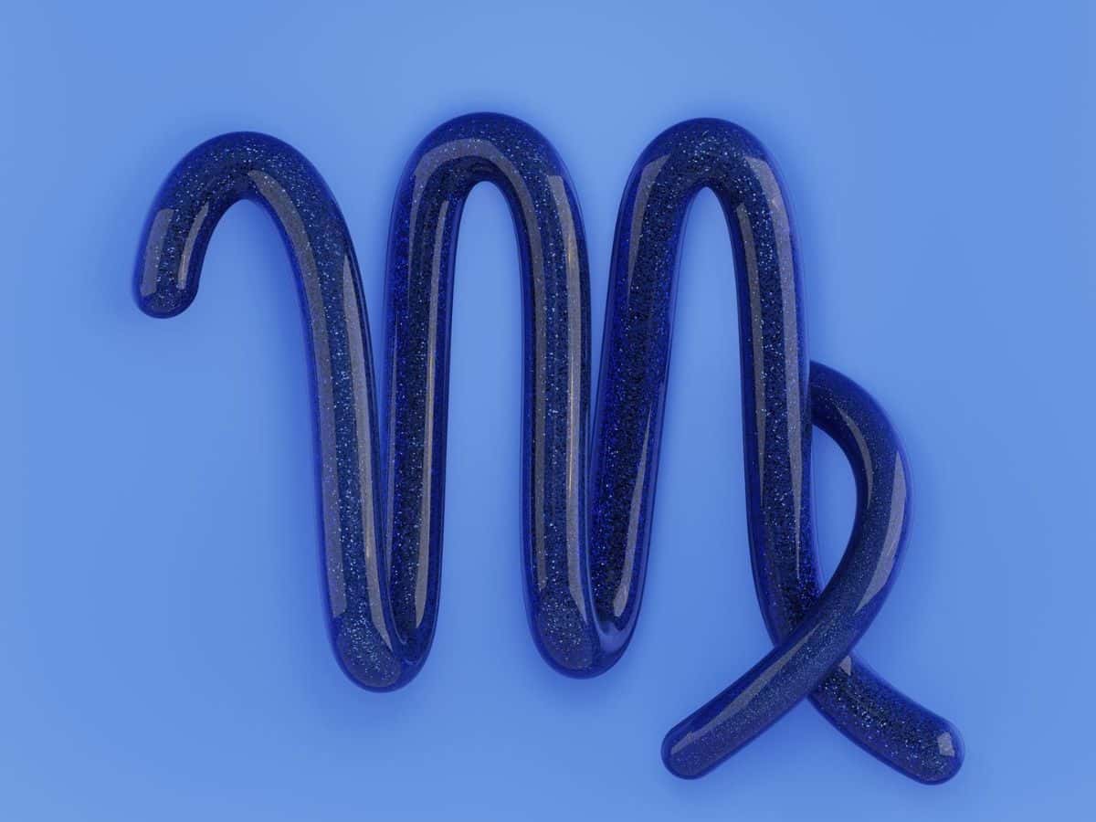 The zodiac sign Virgo on a blue background.