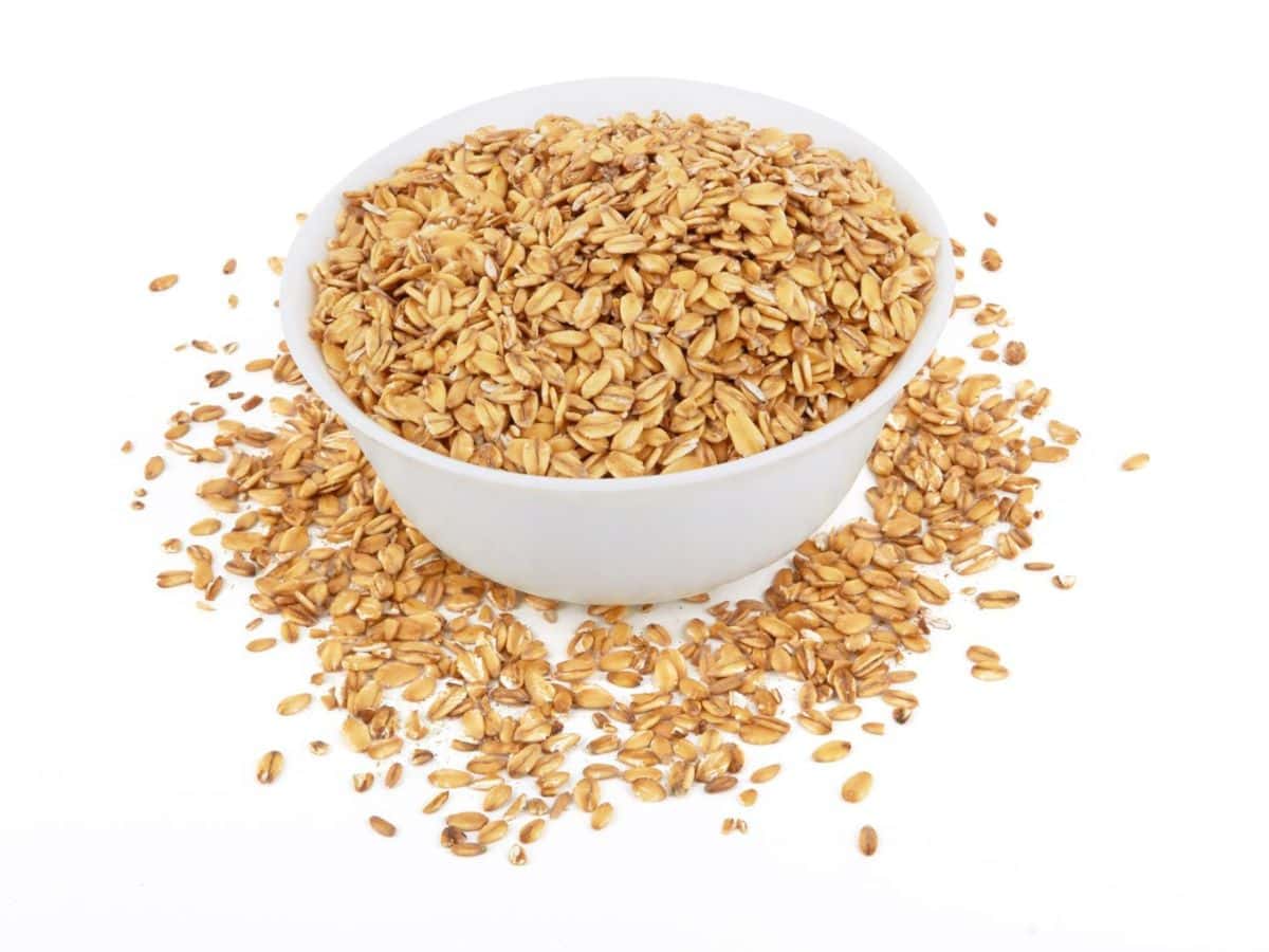 Oatmeal in a bowl on a white background.