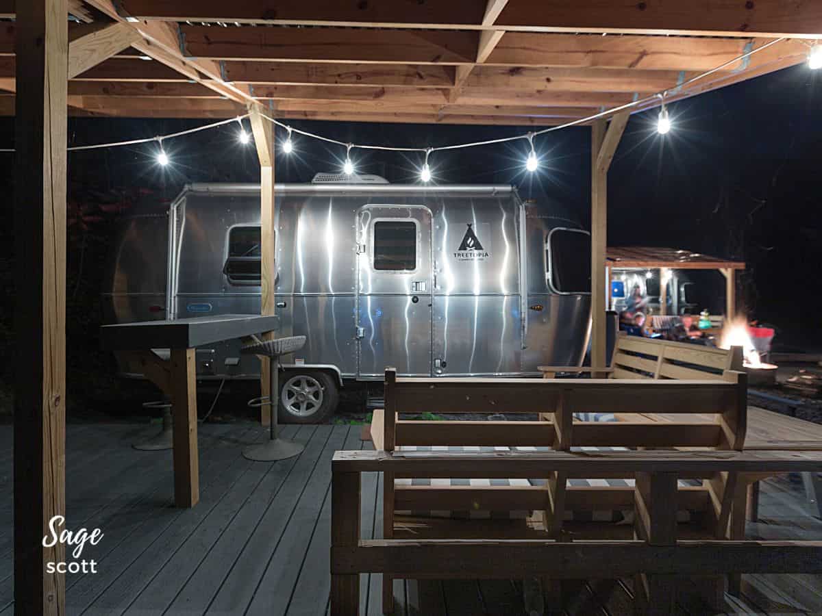 A wooden deck attached to my Airstream at the Treetopia Campground in Upstate New York.