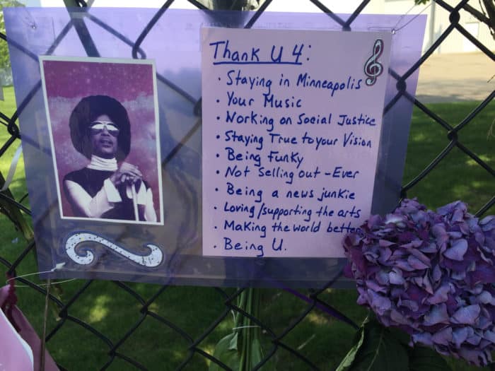 A tribute to Prince left on the fence by Paisley Park.