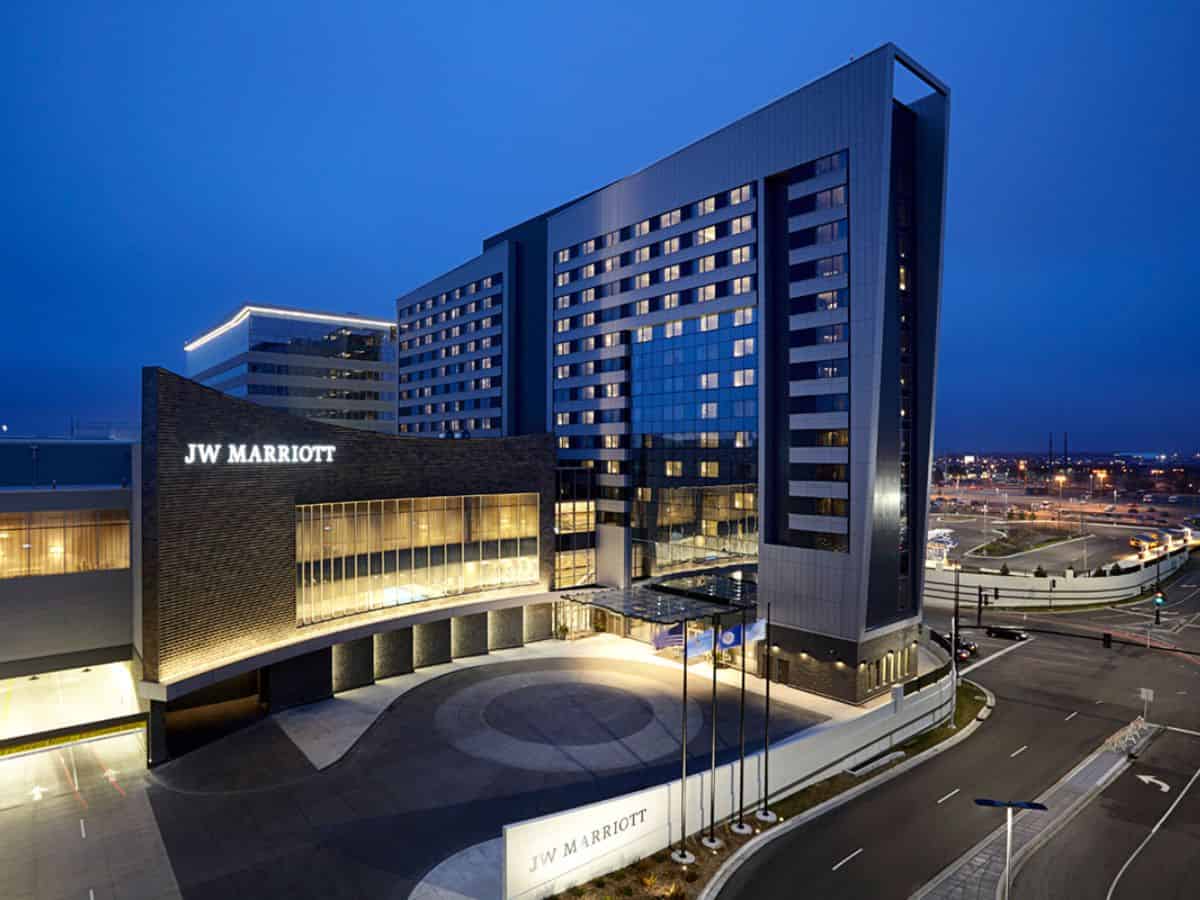 The Hilton hotel in a city at night, located near the vibrant Mall of America.