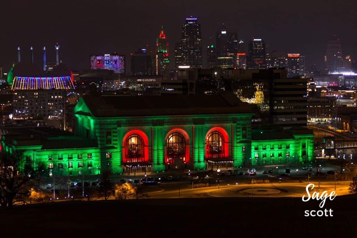 Union Station lit in red and green lights for the holidays