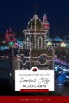 Night view of the Kansas City Plaza Lights, featuring illuminated towers and festive decorations.