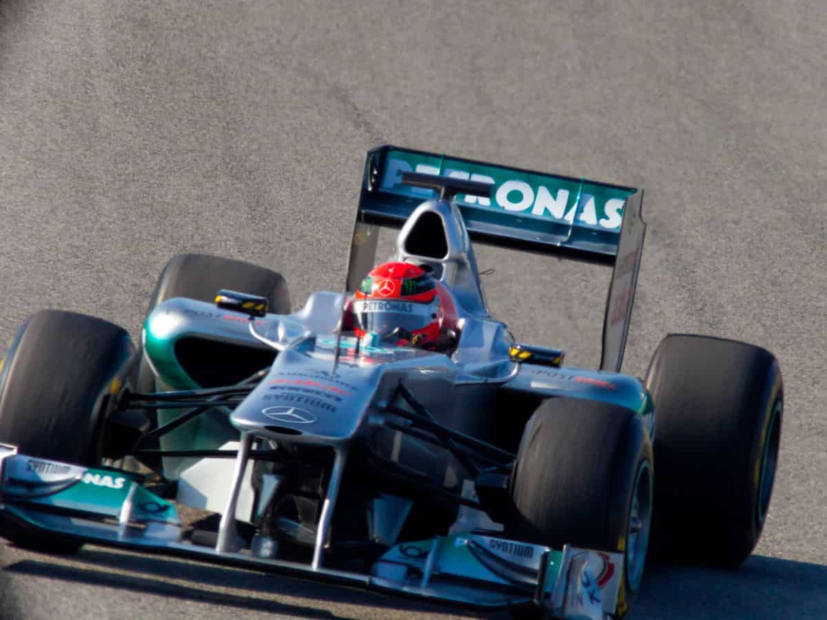 A Mercedes Formula 1 racing car zooming around a track in Germany.