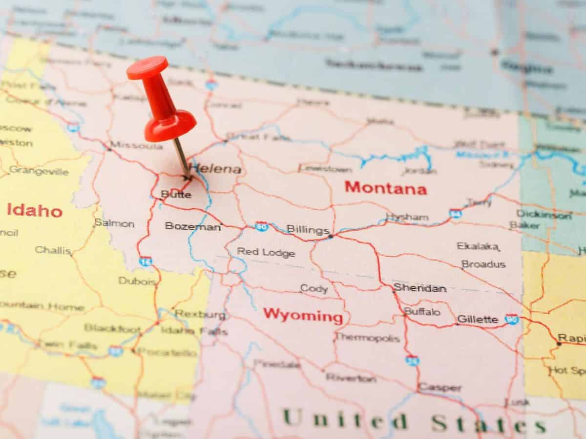 A pin is pinned on a map of Montana.