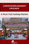 Entrance to Christkindlmarket Chicago with holiday decorations, wooden stalls, and people walking around.