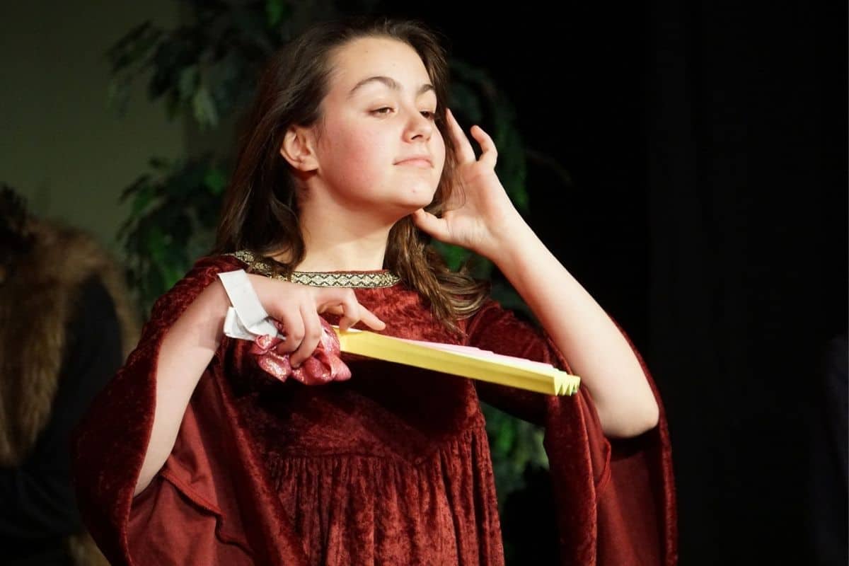 A young performer on stage at the NOVA Center for the Performing Arts in Billings