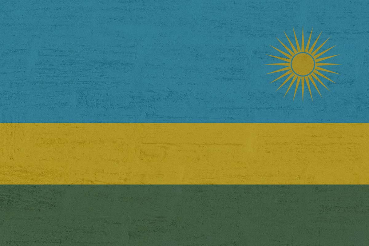 Rwanda has a triband flag with a yellow sun in the corner.