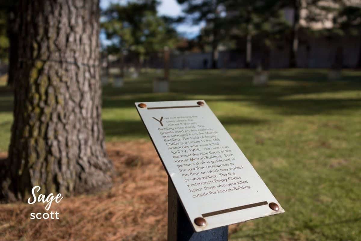 Sign Near the Field of Empty Chairs