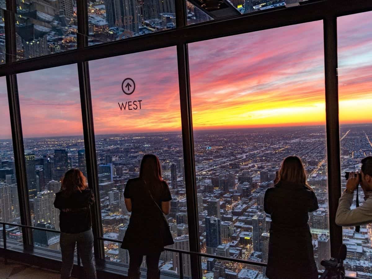 Viewing the city at sunset at Skydeck Chicago