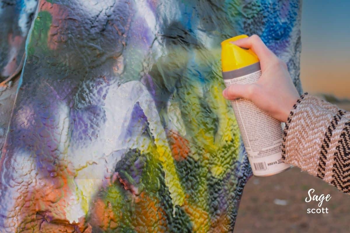 Spray Painting a Car at Cadillac Ranch