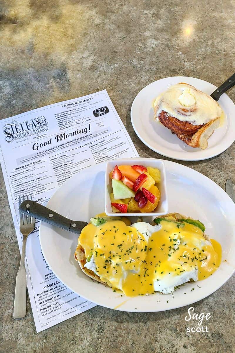 Eggs benedict and a cinnamon roll at Stella's
