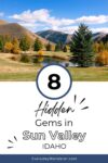 Scenic view of Sun Valley, Idaho, with a lake, trees, and mountains. Text reads "8 Hidden Gems in Sun Valley, Idaho.