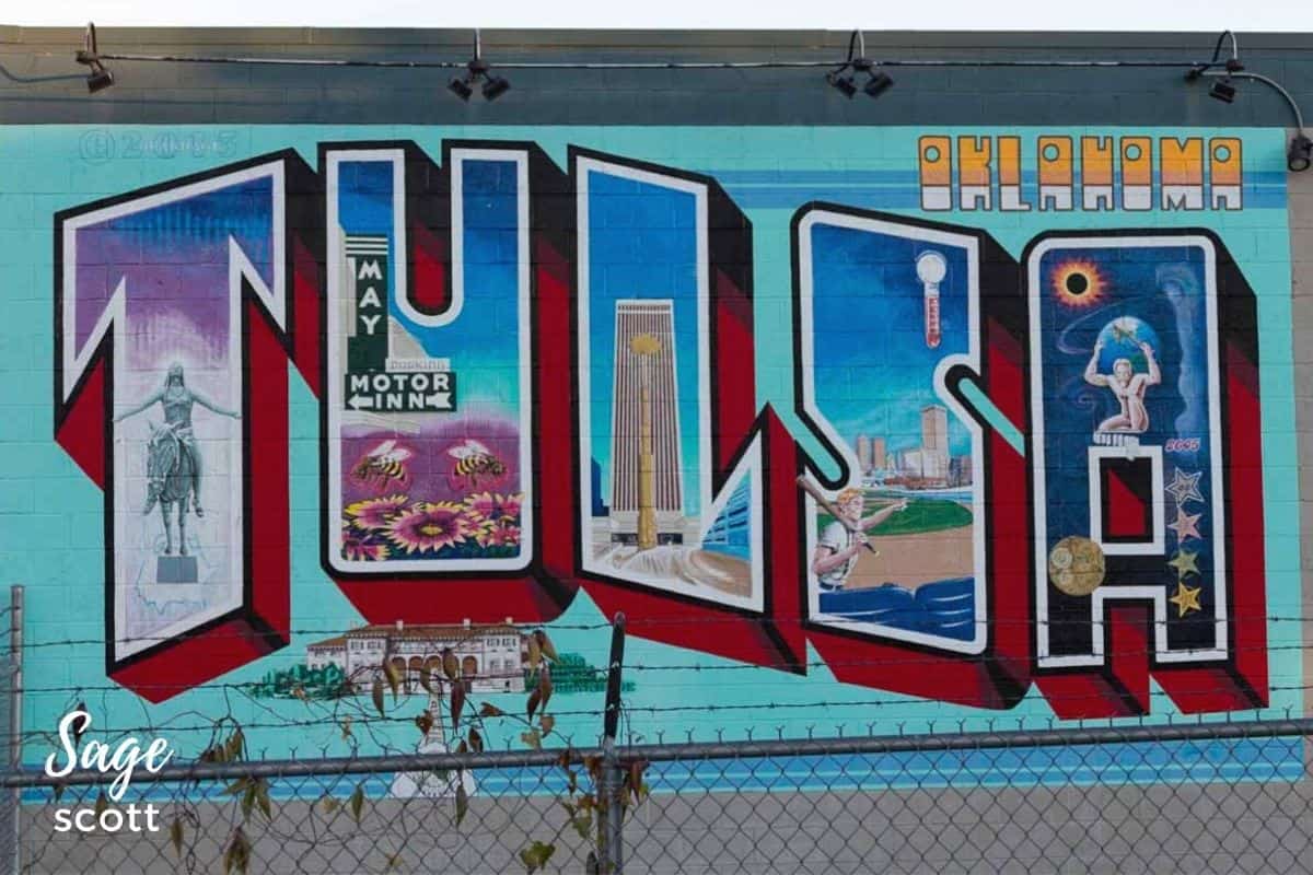 Tulsa postcard mural with landmarks incorporated into the letters of the city