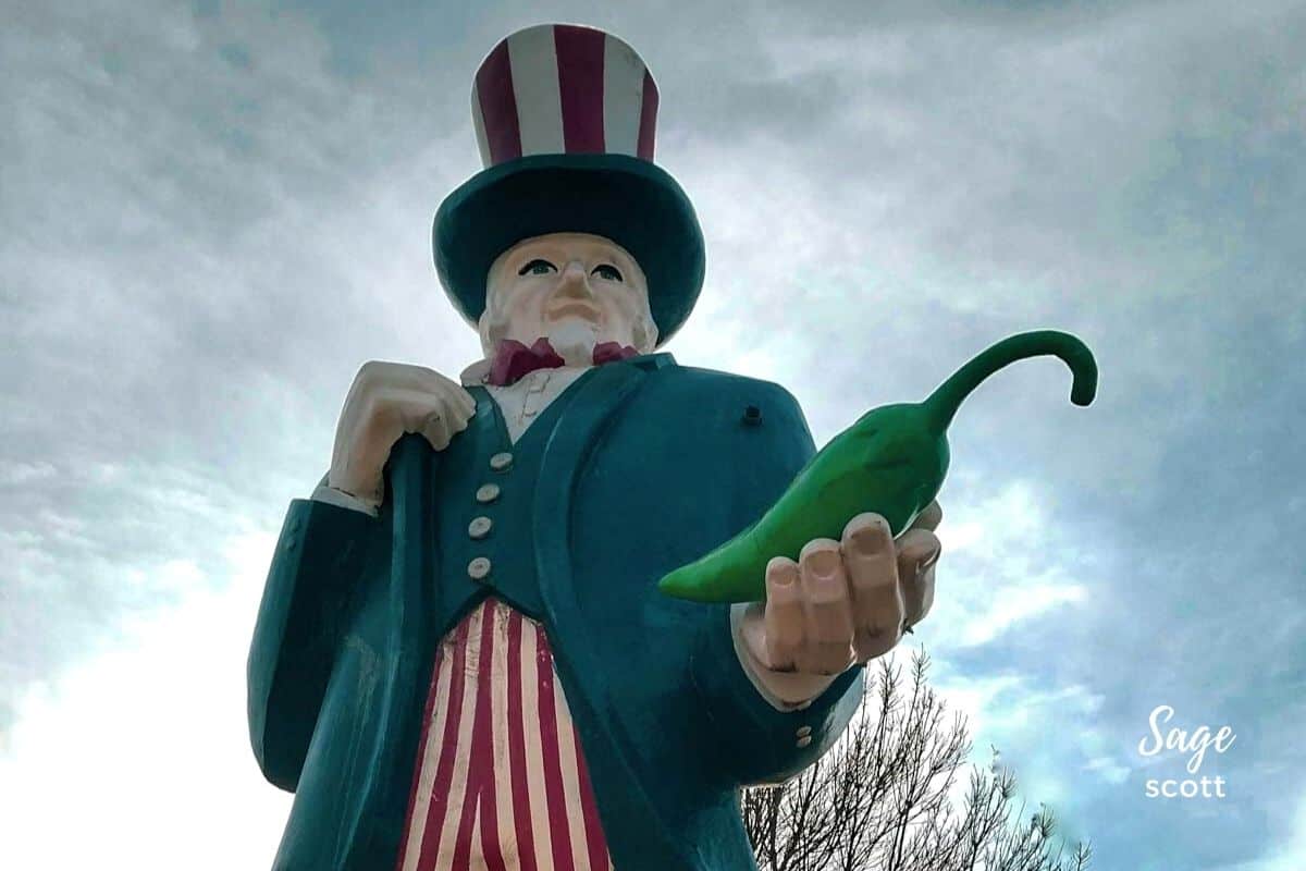 A giant Uncle Sam statue holding a green chile in Hatch New Mexico
