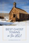 A wooden building in a snowy landscape, under a clear blue sky. Text overlay reads: "Best Ghost Towns in the USA.