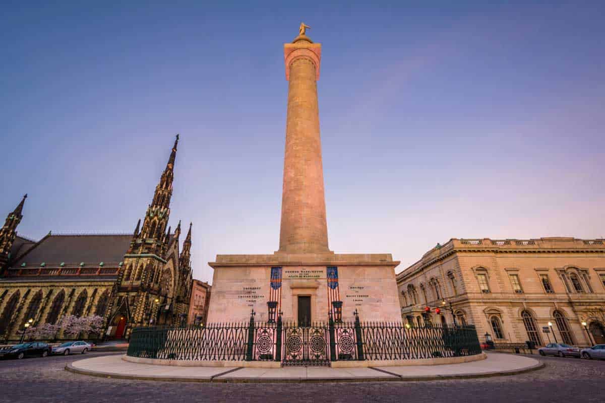 The Washington Monument, an impressive obelisk, stands tall in the heart of a bustling city.