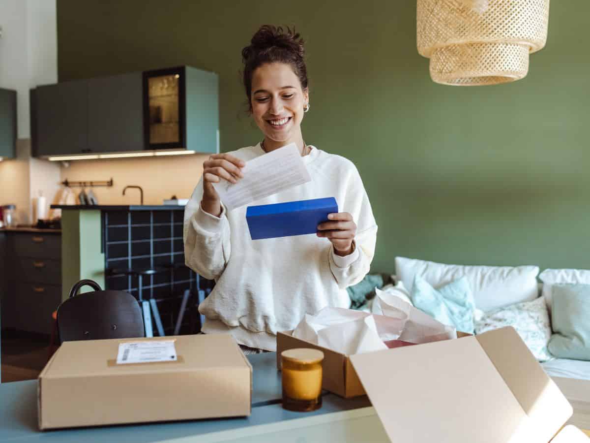 Woman Opening Gift Box