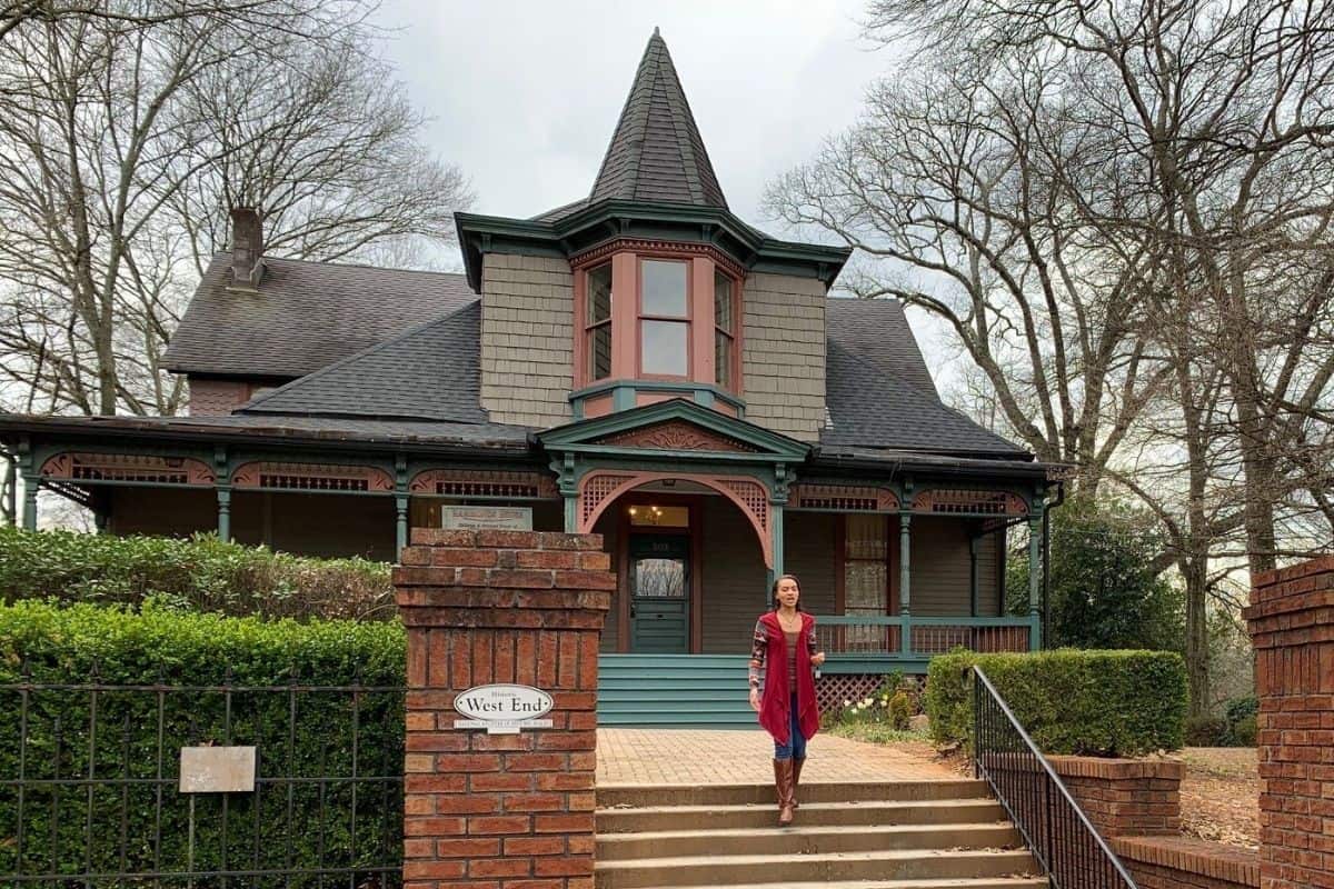 Woman Walking Down Stairs of Hammonds House Museum in Atlanta, Georgia